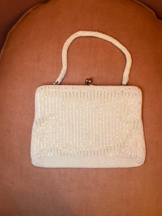 Pochette sartoriale con perline ricamata a mano